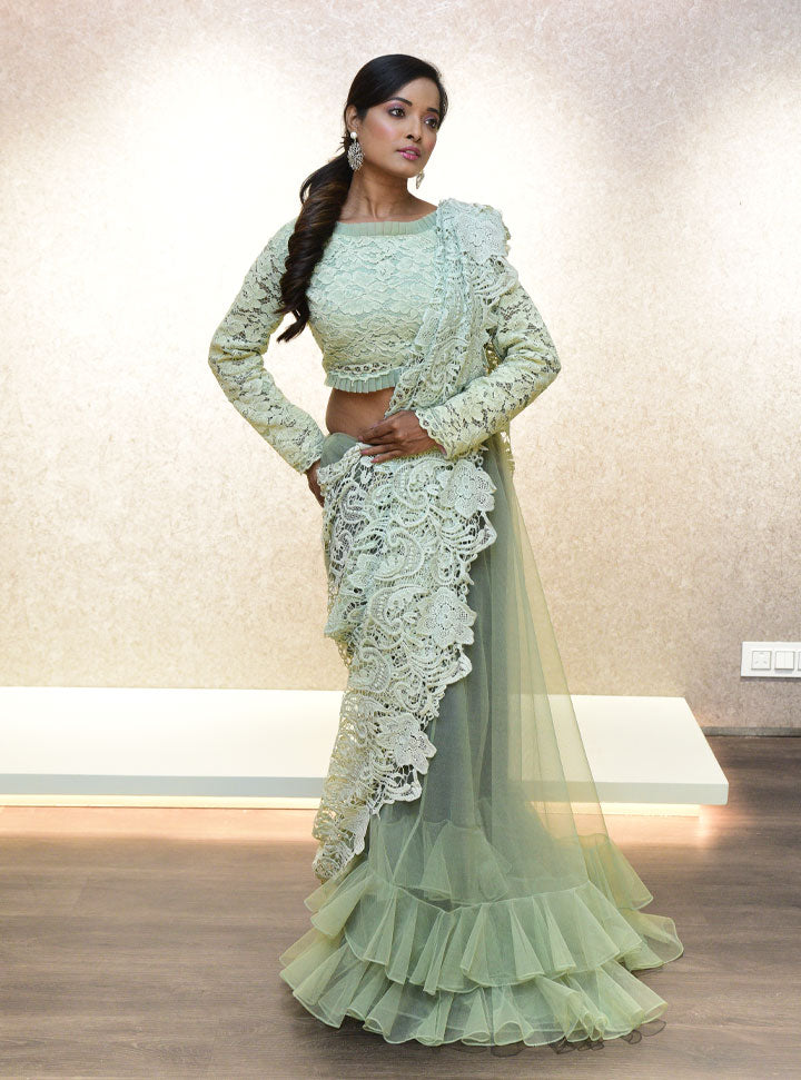 Light green ruffled bottom designer saree