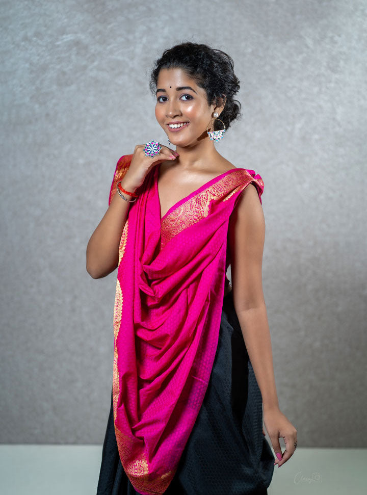 Dark green and bright pink traditional designer saree